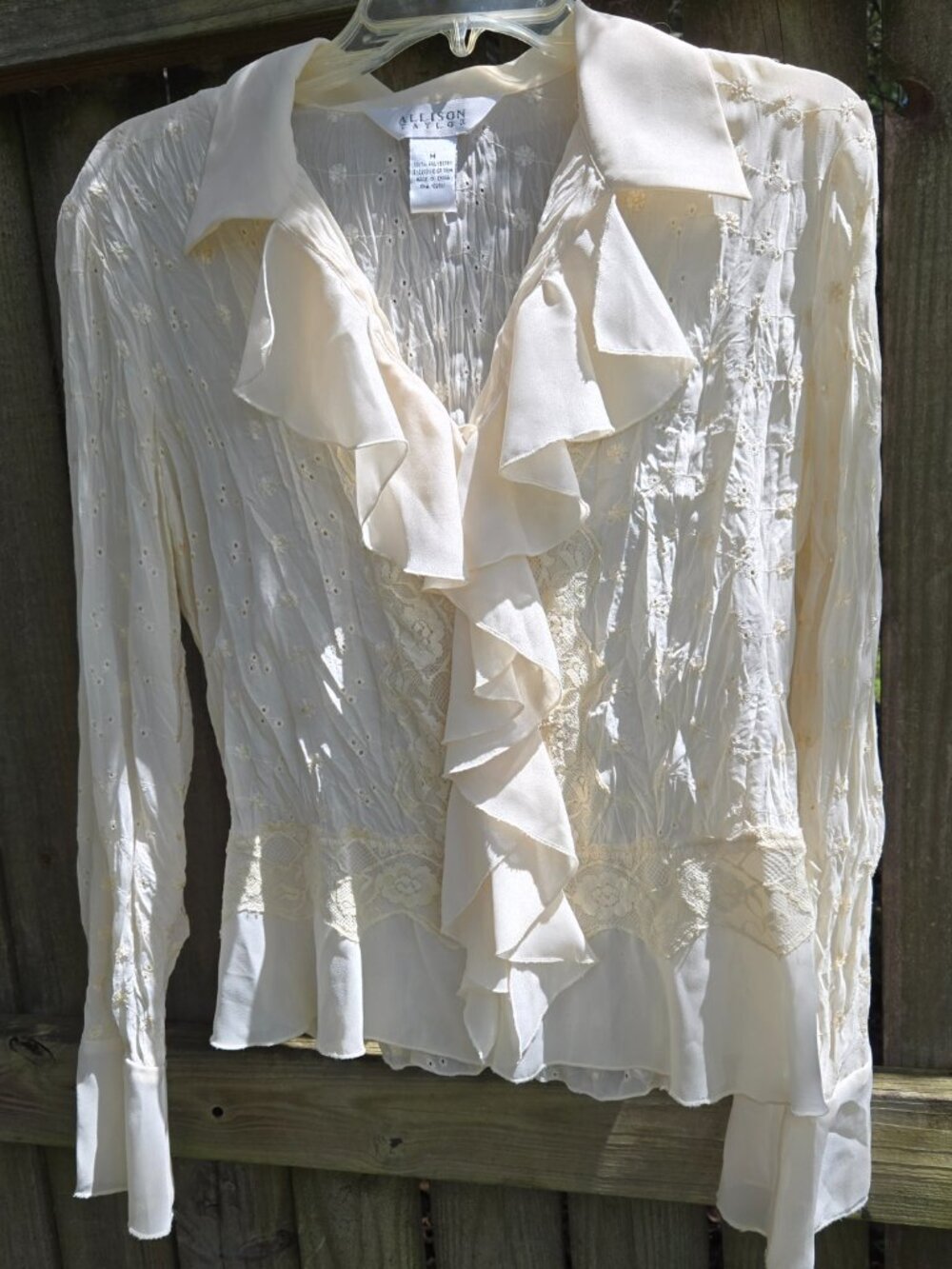 Sexy Feminine blouse that is always in style; sheer eyelet fabric w lace